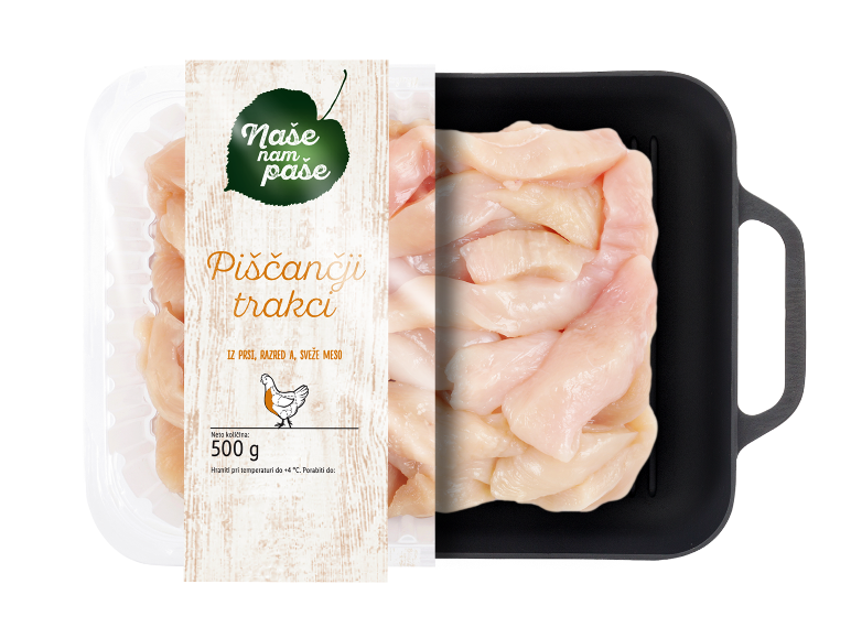 Pakirani sveži piščančji trakovi, 500g, z etiketo z lesnim vzorcem.