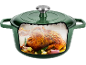 Zelen litoželezni lonec s pečenim piščancem, česnom in zelišči v notranjosti.
