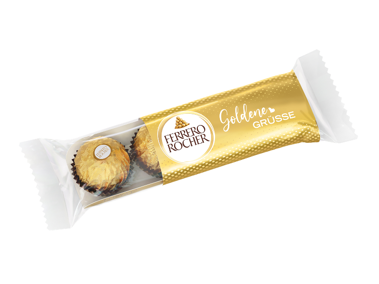 Zlata pralina v prozorni embalaži z napisom „Goldene Grüsse“.