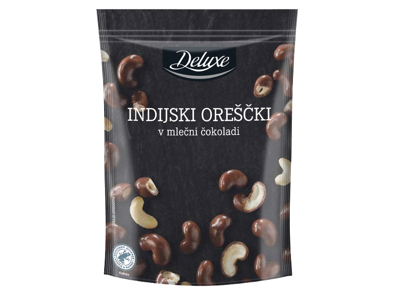 Indijski oreščki v mlečni čokoladi v vrečki, z napisom 'INDIJSKI OREŠČKI v mlečni čokoladi'.
