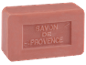 Rožnato milo z napisom 'SAVON DE PROVENCE' v reliefu.