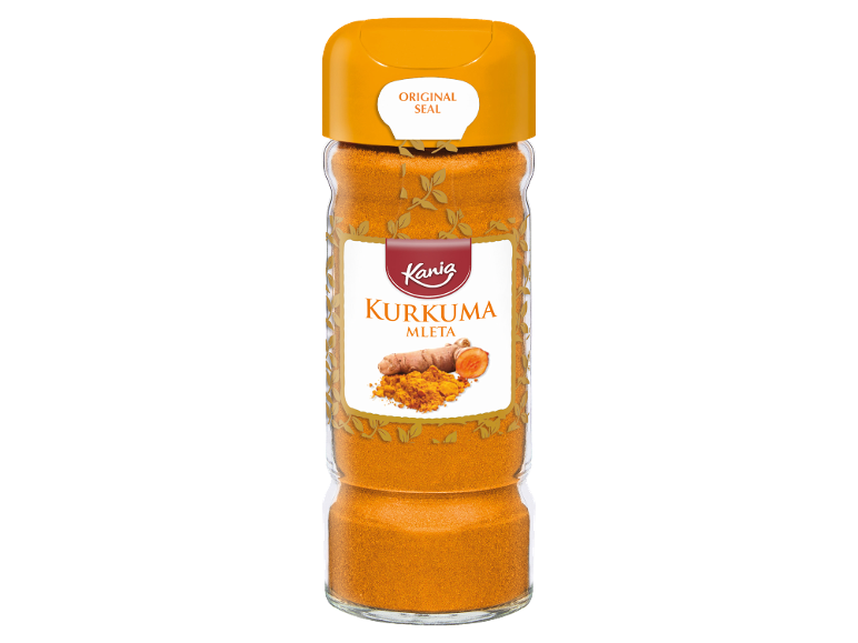 Steklen kozarec mlete kurkume, s korenino kurkume in prahom na etiketi.