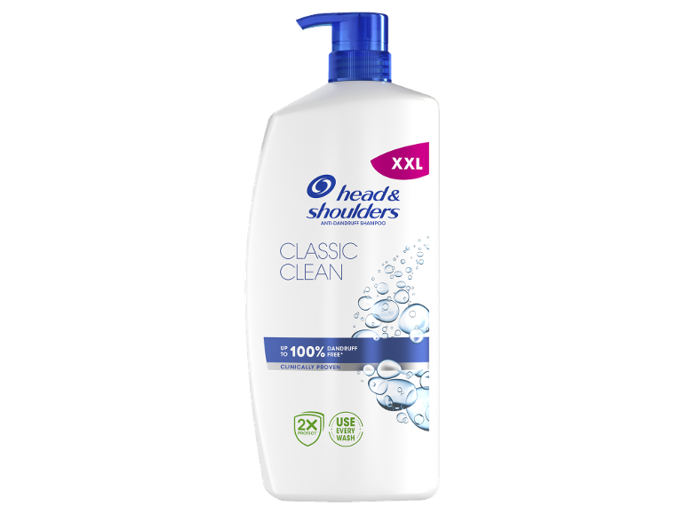 Velika steklenica šampona proti prhljaju z napisom »Classic Clean« in mehurčki.