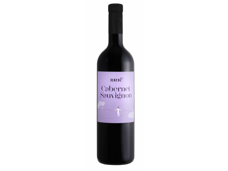 Steklenica rdečega vina Cabernet Sauvignon z vijolično etiketo, ki prikazuje sprehajalca po vrvi.