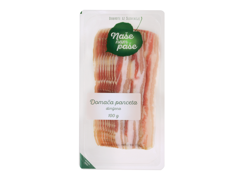 Paket 100 g dimljene slanine z napisom »Naše nam paše«.