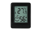 Črni digitalni termo-higrometer z zaslonom, ki prikazuje 27.9°C in 56% vlažnost.