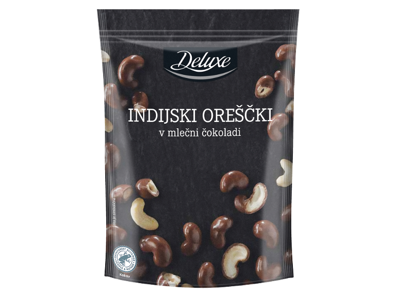 Indijski oreščki v mlečni čokoladi v vrečki, z napisom 'INDIJSKI OREŠČKI v mlečni čokoladi'.
