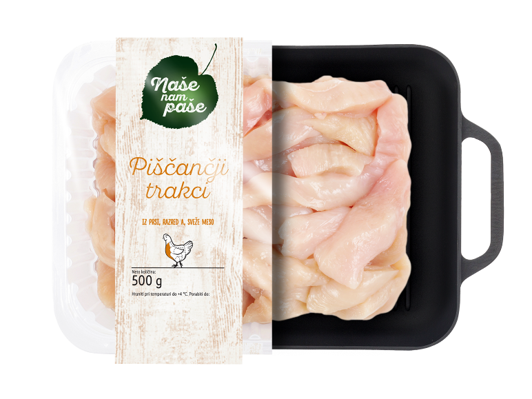 Pakirani sveži piščančji trakovi, 500g, z etiketo z lesnim vzorcem.