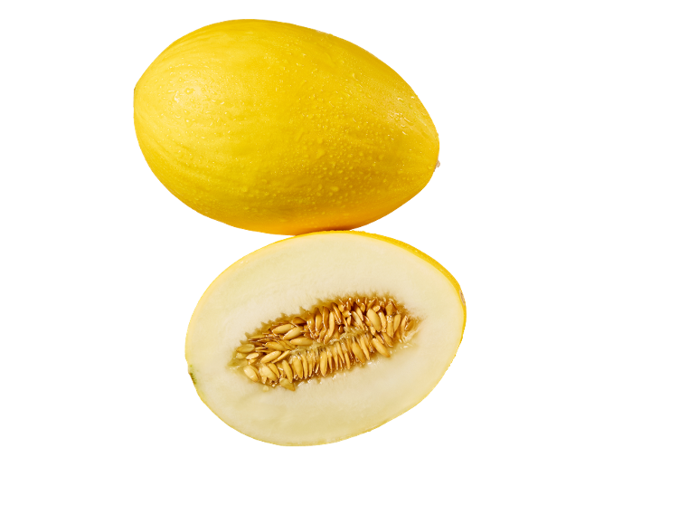 Sveža rumena melona, cela in prepolovljena, z vidnimi semeni.