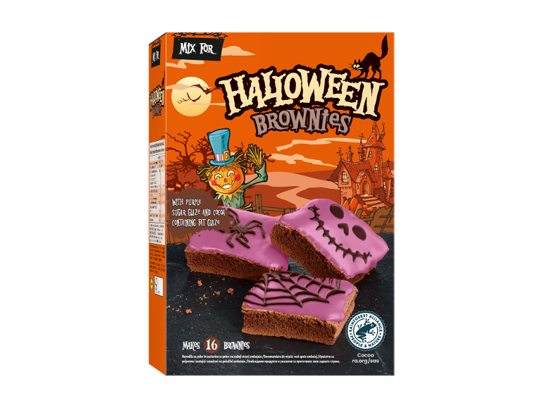 Mešanica za Halloween Brownije z vijolično glazuro in pajkovimi okraski.