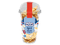Kozarec pokovke z belo čokolado in marshmallowom, z barvnimi čokoladnimi gumbi.