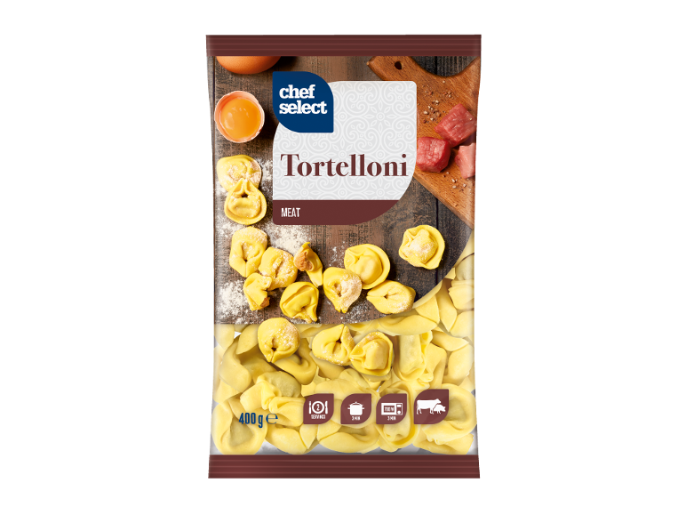 Paket mesnih tortellonov z jajcem, moko in surovimi kosi mesa, ki označuje 2 porciji in hitro kuhanje.