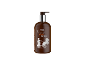 Tekoče milo s črnim poprom in zeliščnim vonjem v rjavi steklenički z dozirnikom.