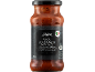 Steklen kozarec Ragu Bolognese omake za testenine s črno etiketo in srebrnimi detajli.