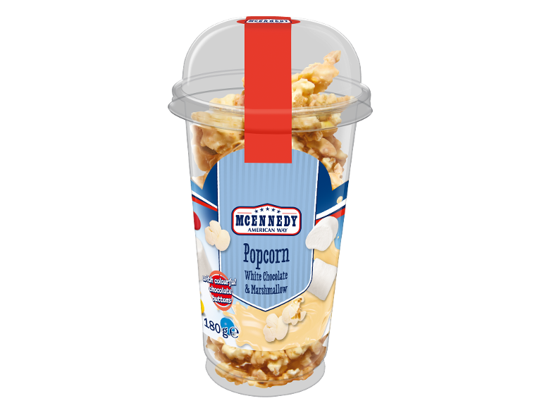 Kozarec pokovke z belo čokolado in marshmallowom, z barvnimi čokoladnimi gumbi.