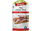 Pakiranje mini salam palčk, „Hot“, 100g, s predlogom za serviranje na leseni deski.