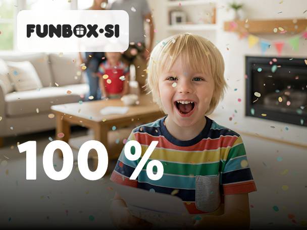 Vesel otrok s konfeti, napisom FUNBOX.SI in 100 %.