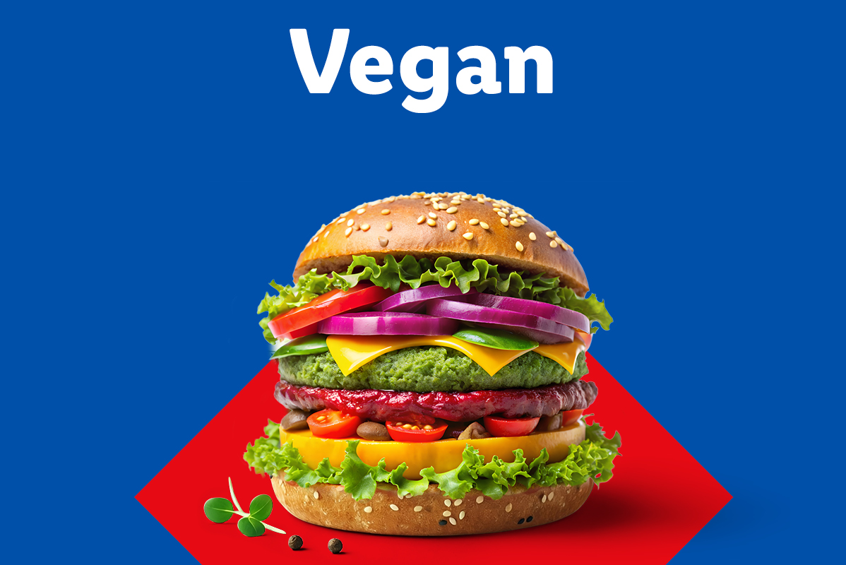 Veganski burger z zelenjavo in veganskim sirom.