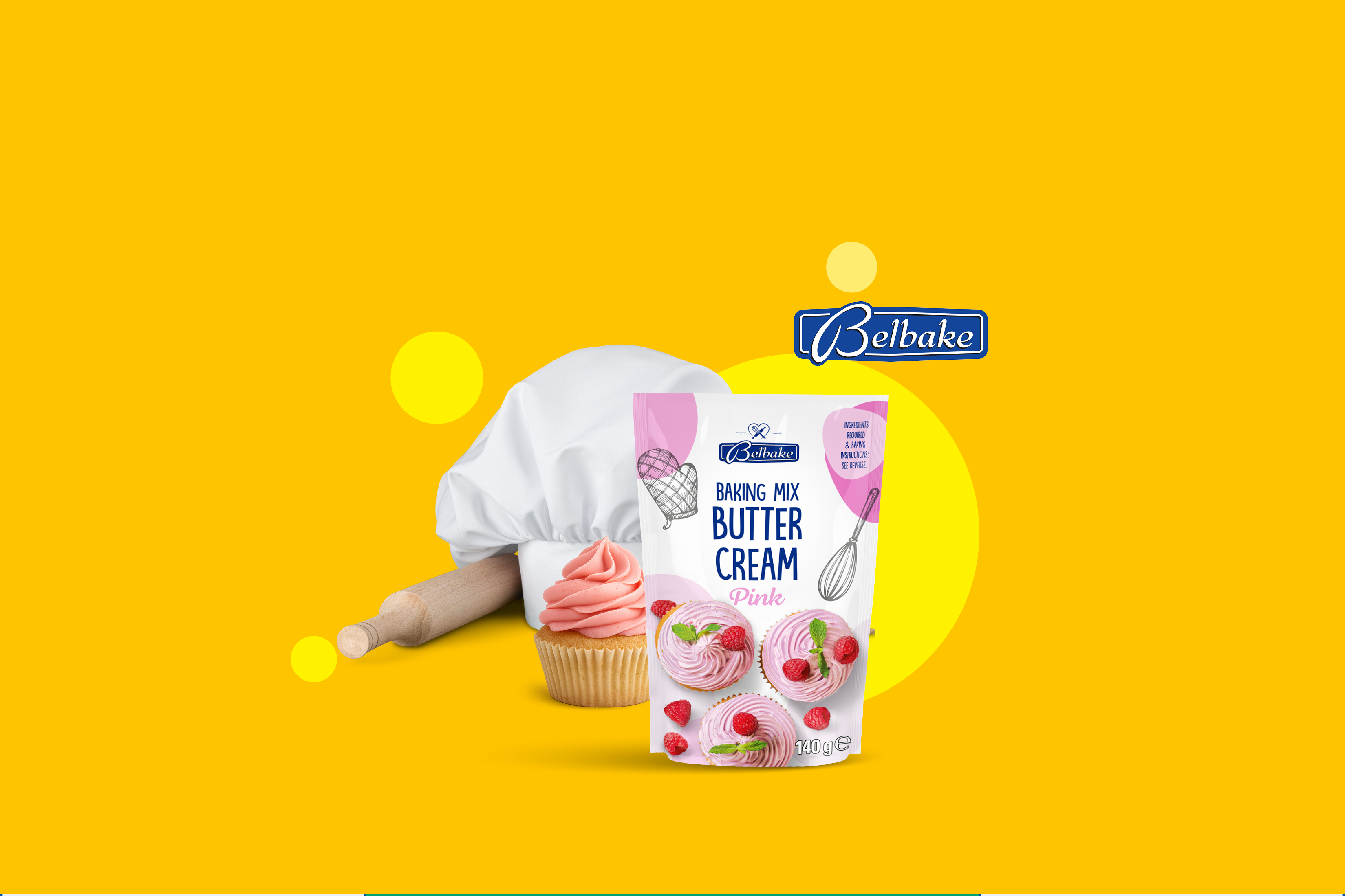 Mešanica za peko maslene kreme v roza barvi, s kapicami in valjarjem.