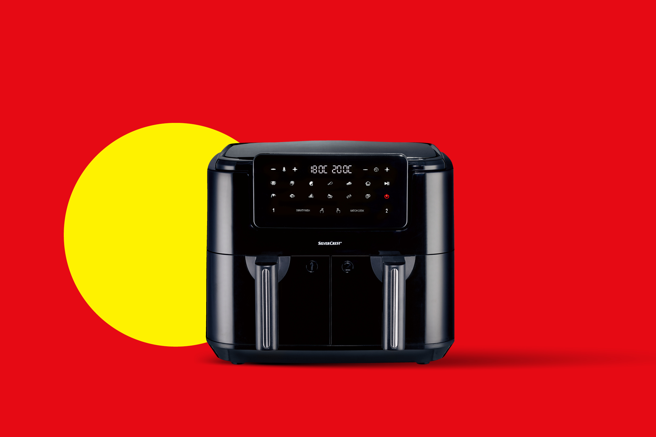 Črn cvrtnik na vroč zrak z dvema predaloma in digitalnim zaslonom na rdečem ozadju z rumenim krogom.