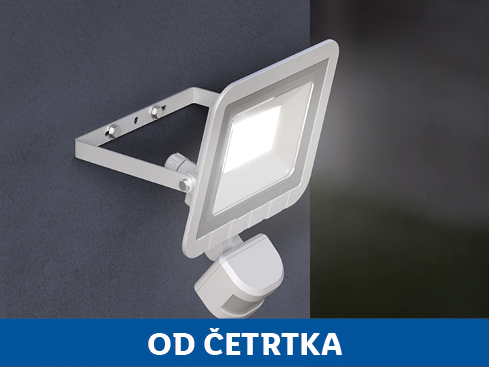 Zunanja LED svetilka z detektorjem gibanja, nameščena na steni.