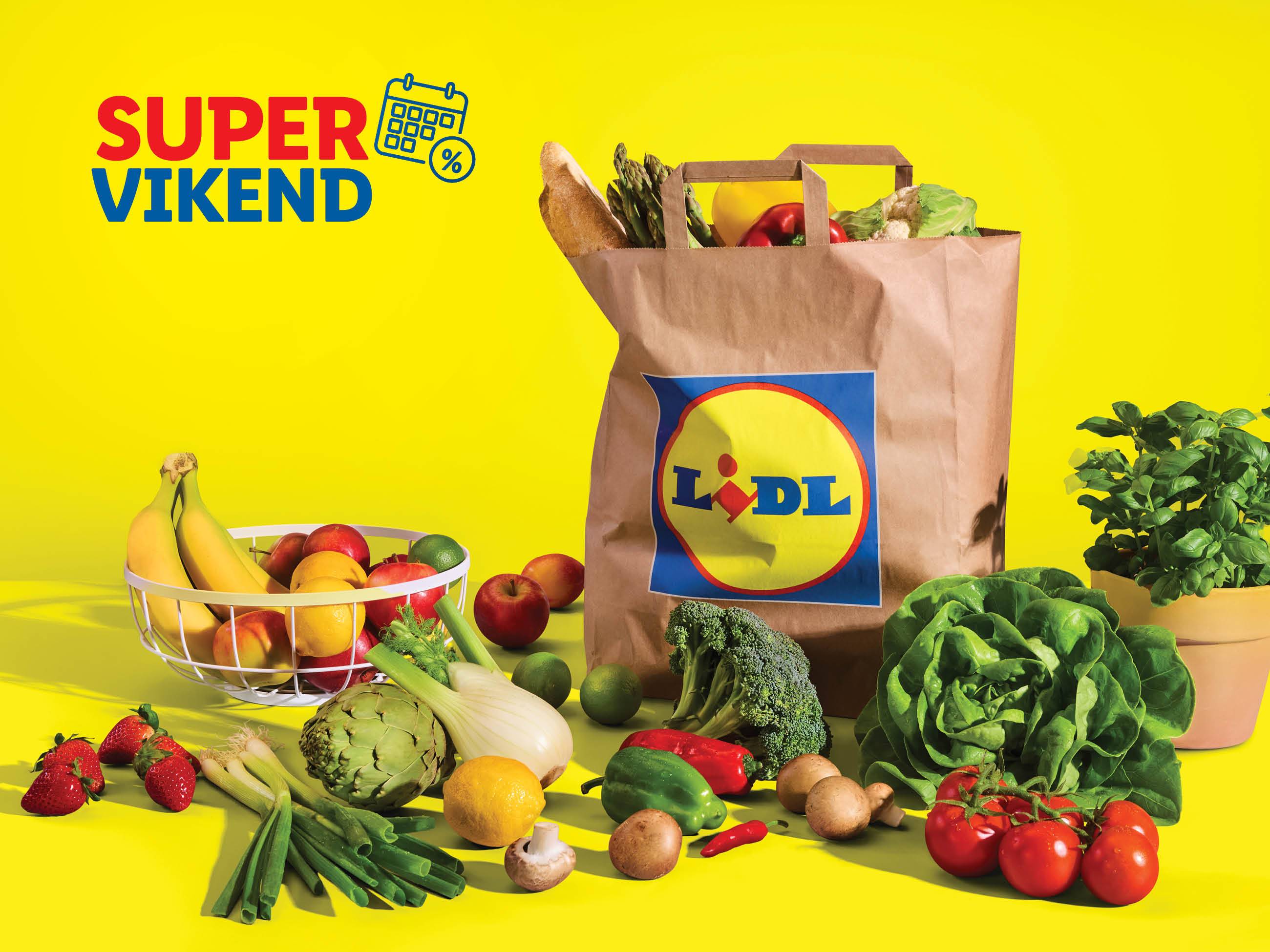 Lidl-ova nakupovalna torba z zelenjavo, sadjem in kruhom na rumenem ozadju; Super vikend akcija.