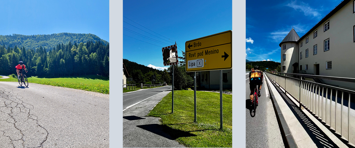 Kolesarji na cesti, gorska pokrajina in grad.