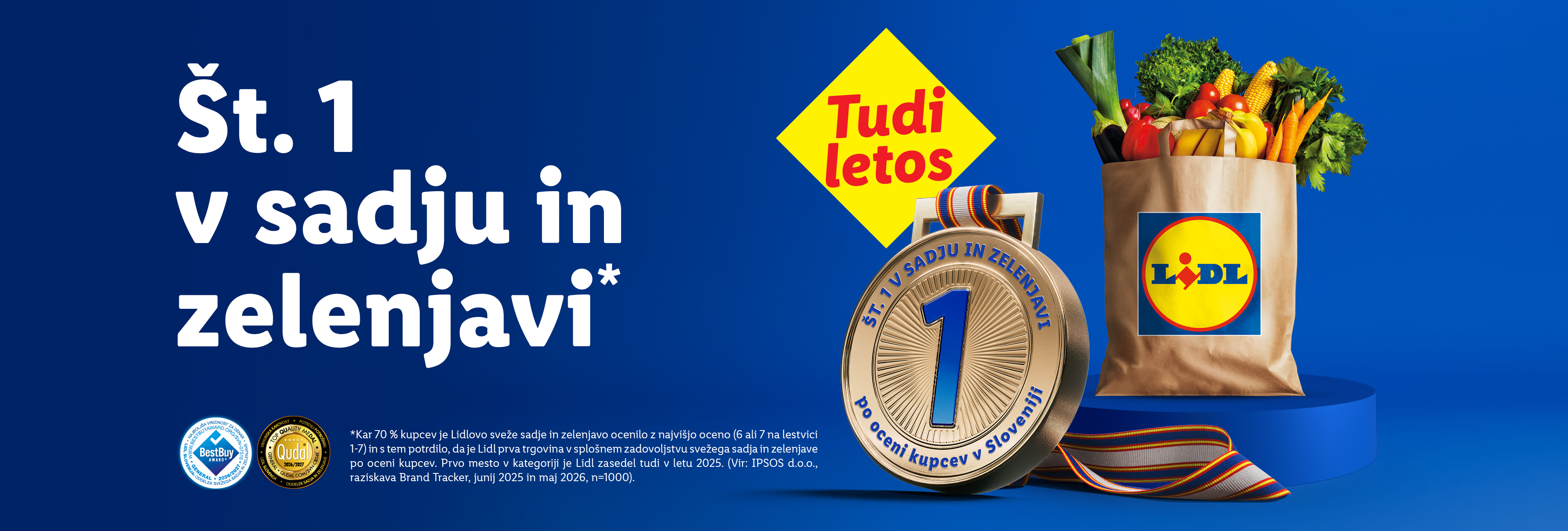 Zlata medalja za najboljše sadje in zelenjavo, poleg nakupovalne vrečke polne svežih pridelkov.