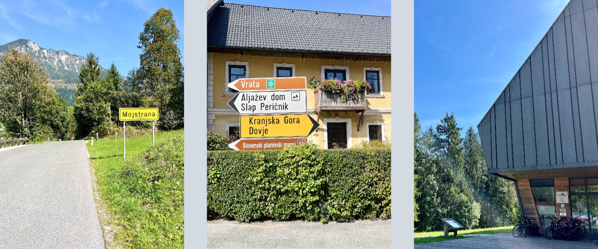 Cesta, hiša, prometni znaki in moderna stavba.