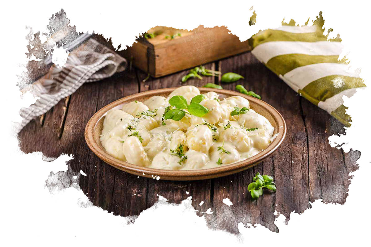 Kremasti njoki z baziliko in parmezanom.