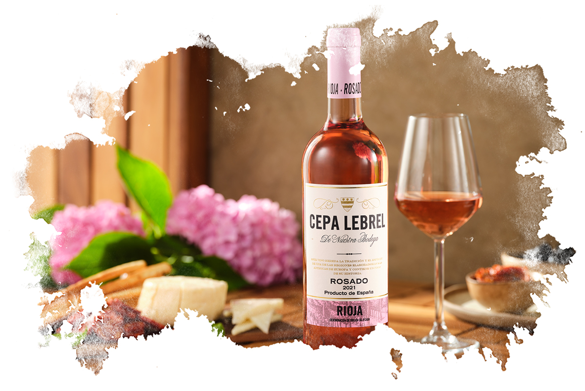 Rosé vino Cepa Lebrel iz Rioja s sirom in prigrizki.